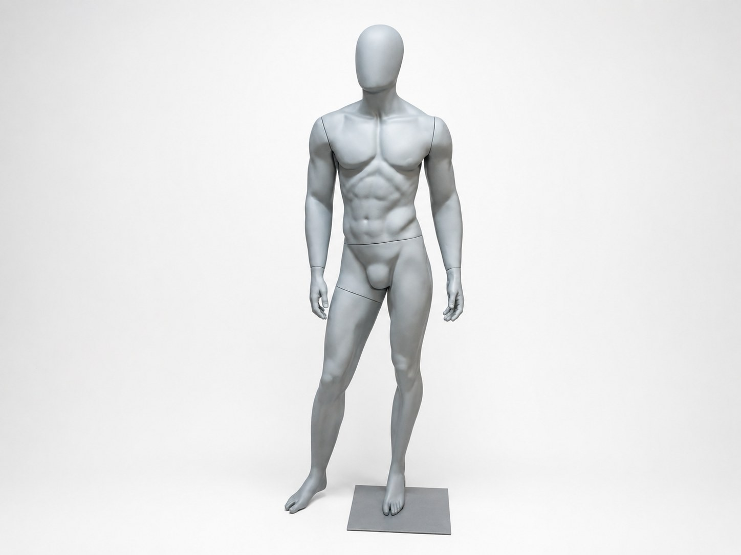 Male mannequin with right leg in front